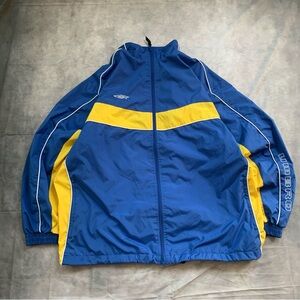 Vintage 90s Umbro blue and yellow windbreaker jacket